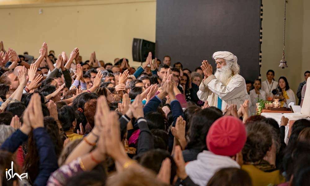 Sadhguru surrounded by the Bhava Spandana program participants at Isha Institute of Inner Sciences, TN, USA  | One Mega Life