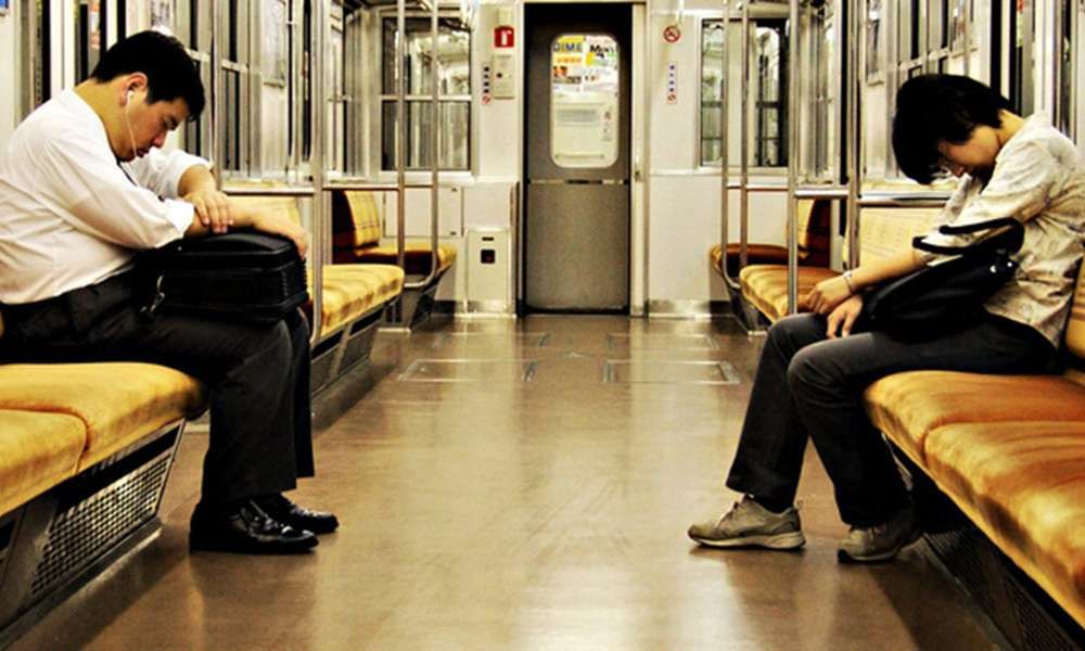 Commuters sleeping in the subway - Improving Sleep Quality
