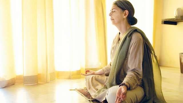 Retired Woman Meditating - What to do when you retire - Life after retirement