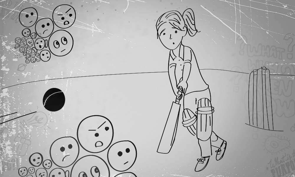 Illustration of a batswoman ready to bat, ball coming at her, and emojis with negative expressions coming at her | How To Deal With People’s Negative Opinions? 