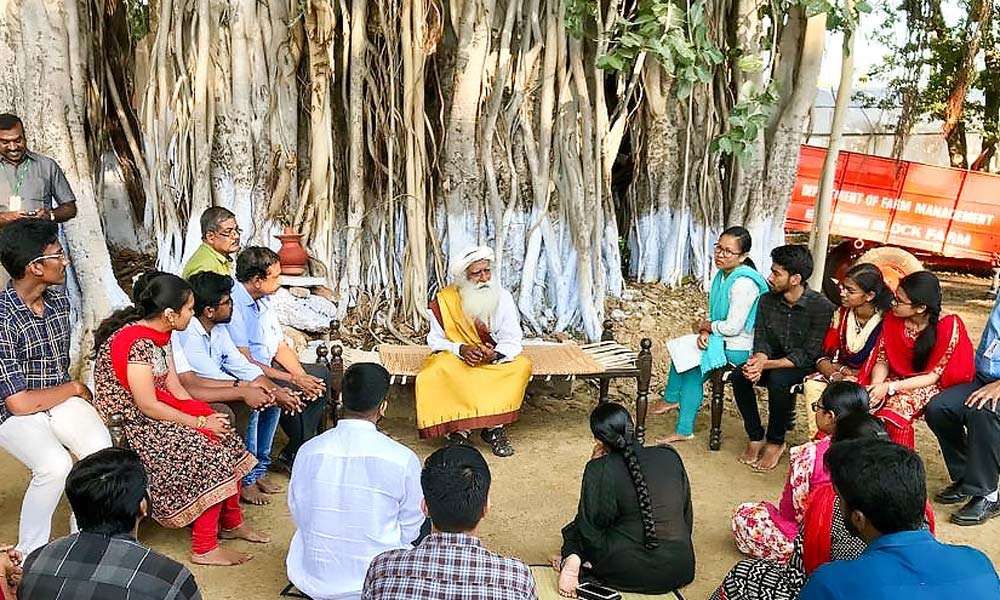 Sadhuru interacts with students of TNAU under a banyan tree | The Pulse of Youth AND Truth - TNAU