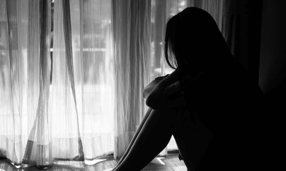 Black and white silhouette image of a woman | What is the Reason for Rape?