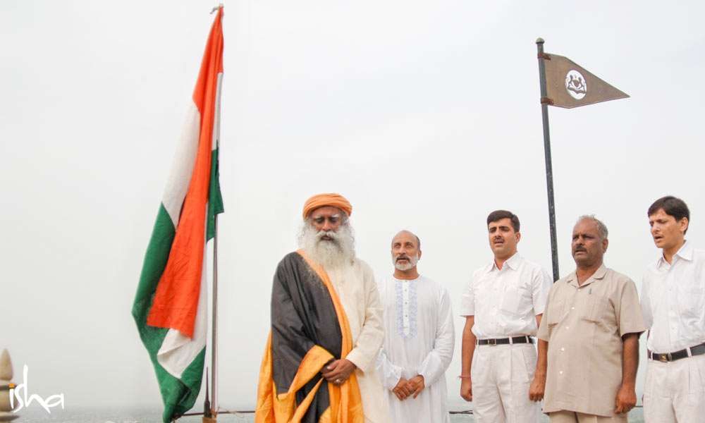 Sadhguru stands before the Indian flag with eyes closed | Should We Stand Up for the National Anthem? 