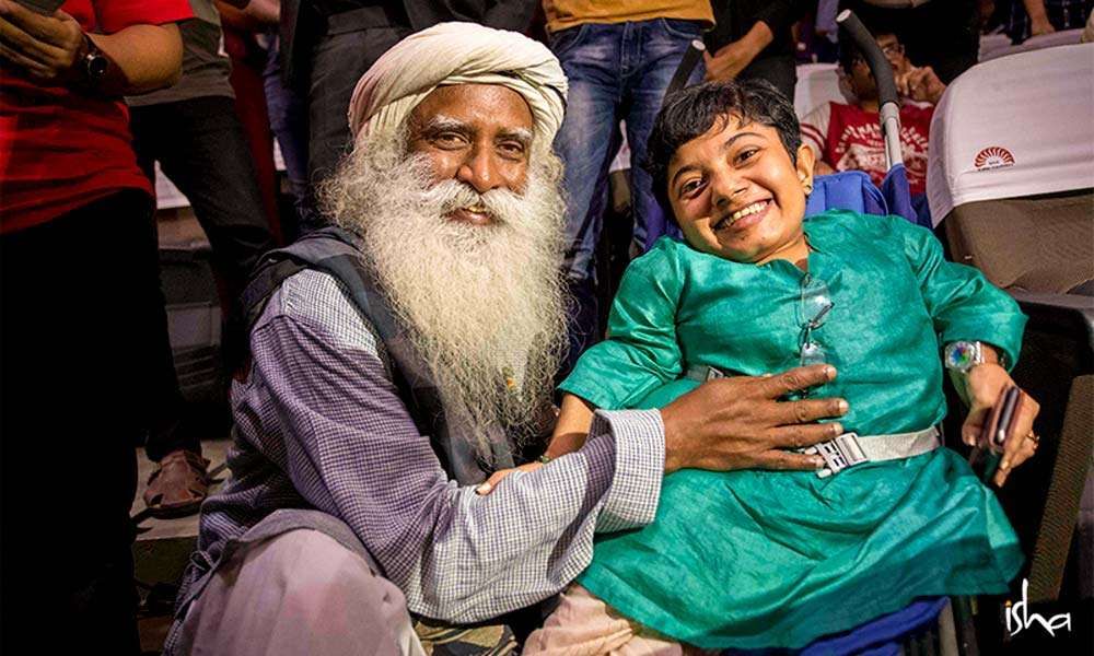 Sadhguru with Dhanya Ravi, participant in the IIM Bengaluru Youth and Truth event | No One Should Be Labelled As Disabled