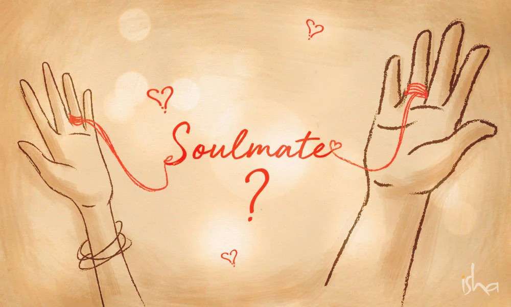 Soulmates - image of two hands tied with a red thread forming the word soulmates