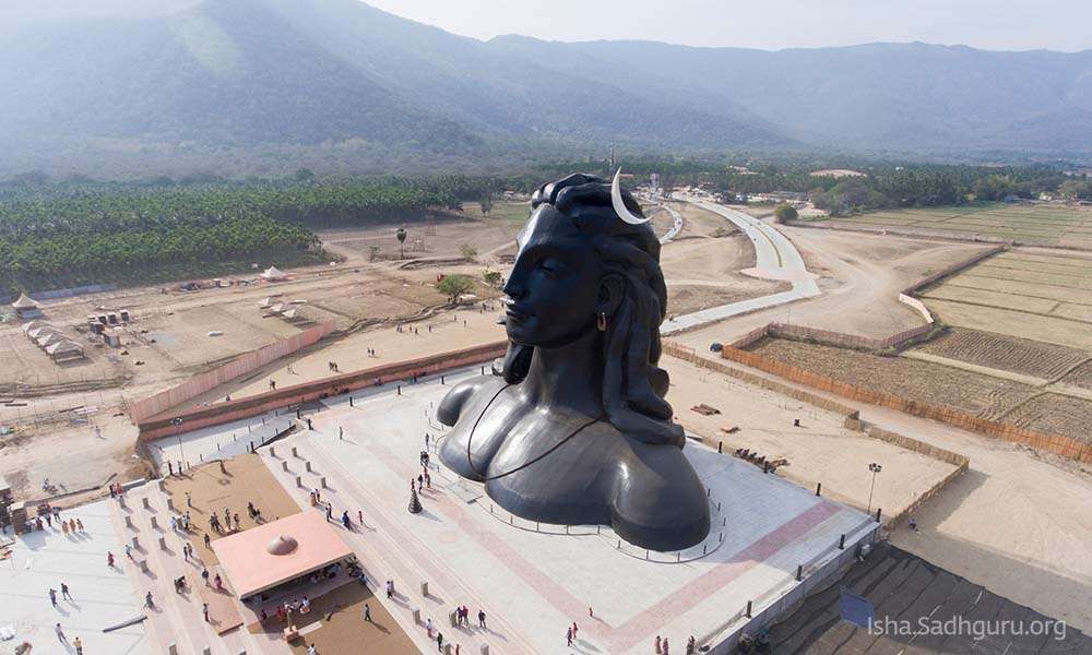 Adiyogi Shiva Statue and Yogeshwar temple, drone shot from high above.