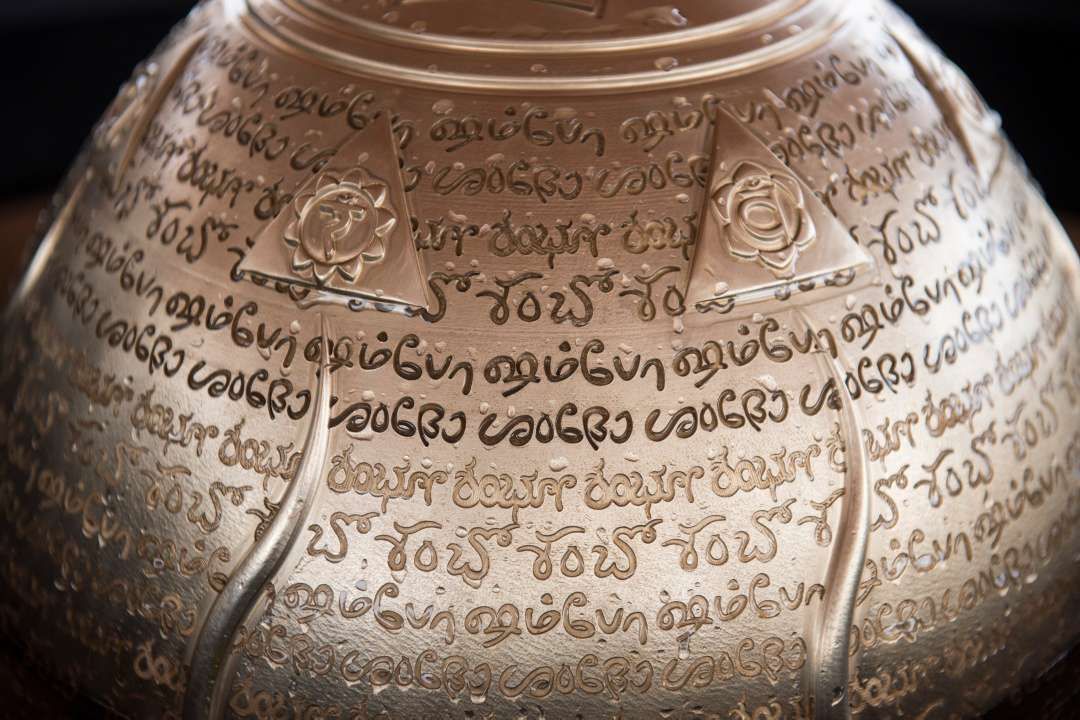 Closeup of the Yogeshwar Linga with visible engravings.