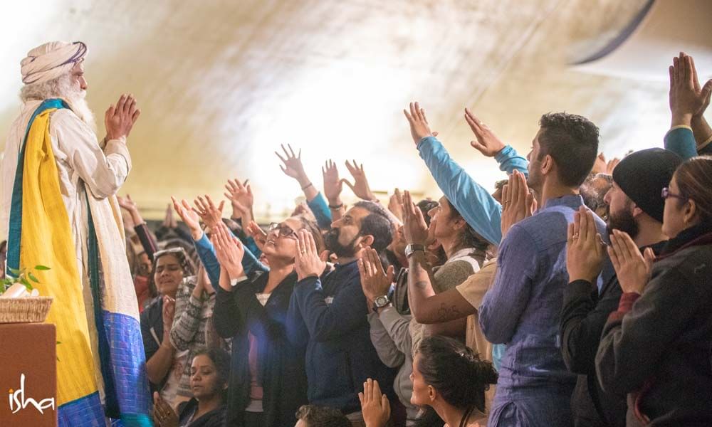 Sadhguru surrounded by the Bhava Spandana program participants at Isha Institute of Inner Sciences, TN, USA  | One Mega Life