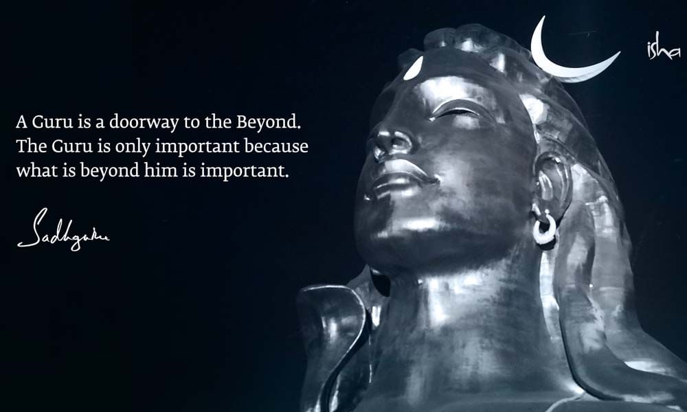 Quote for Guru Purnima with Adiyogi statue in black and white.